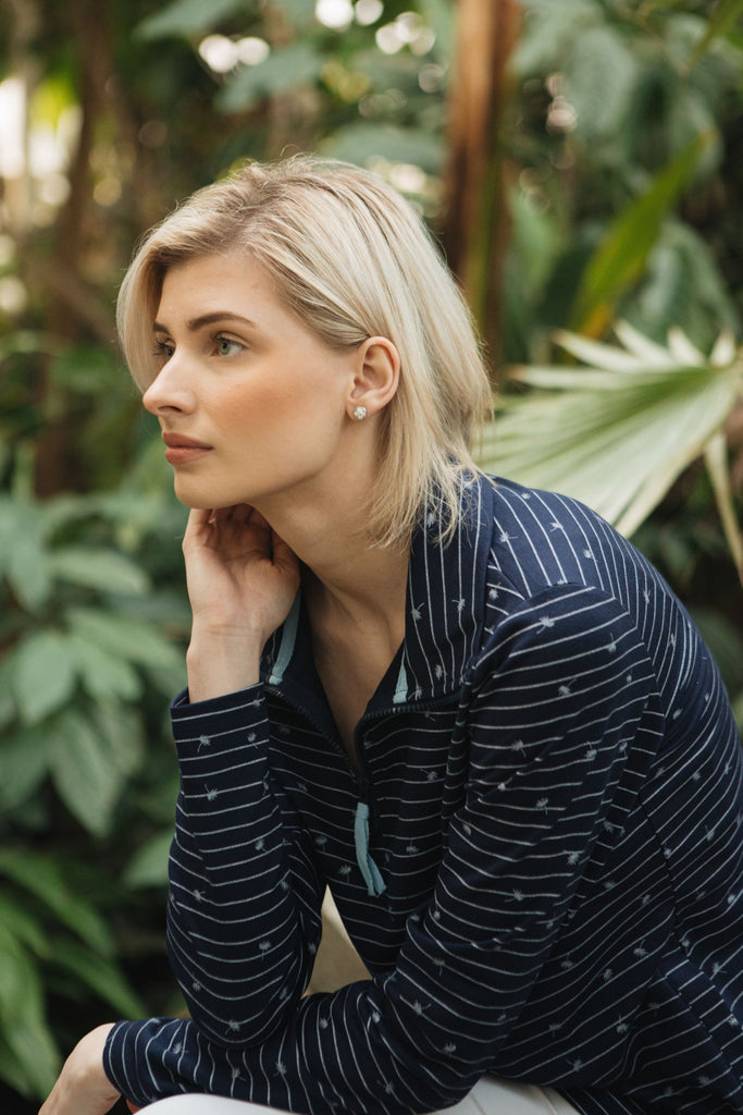 1/2 zip front casual top with our signature Falling dandelion print. long sleeve, regular fit
